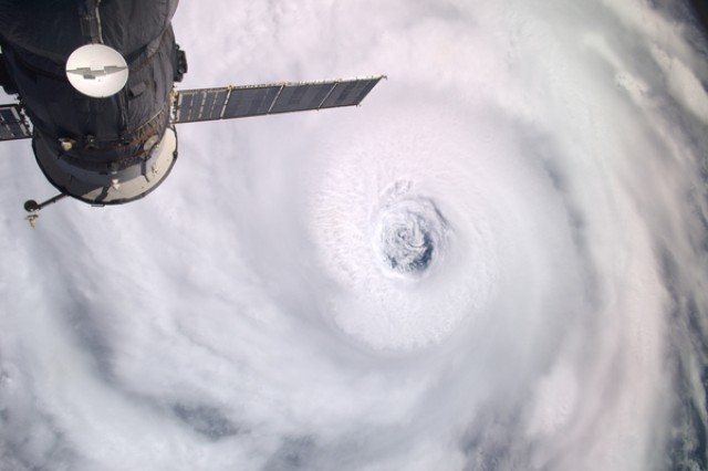 "'Igor the Terrible'...It was about 2:00pm GMT today...out over the Atlantic, and we came upon the monster, Hurricane Igor. This storm is enormous with an impressive eye wall. Seeing the blue water down through the eye of the storm is so surreal. I c...
