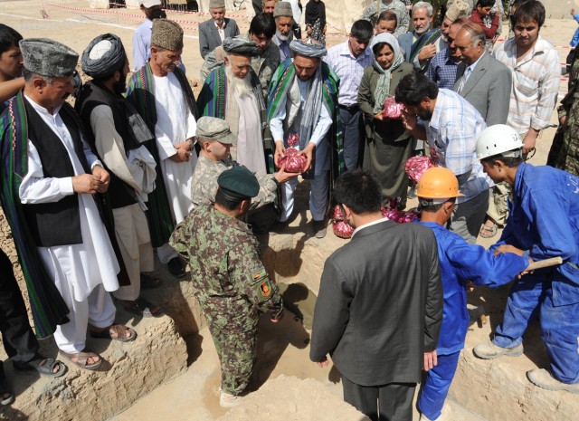 1st BSTB Soldiers help break ground at local school