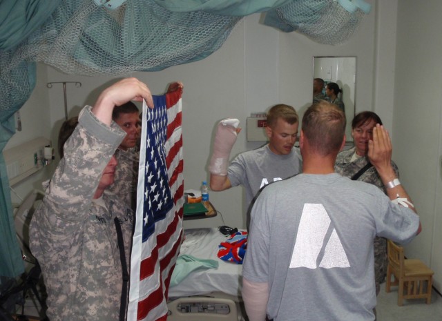 TF Iron Rakkasan Soldier reenlists after being wounded in action