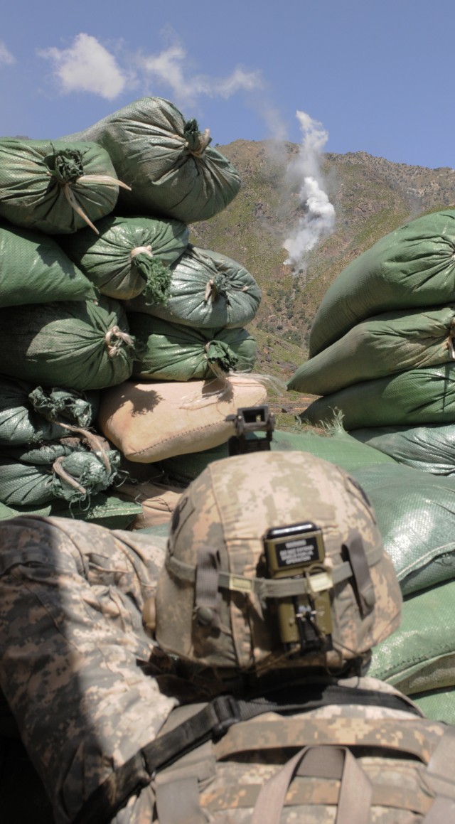 Observing mortar fire from checkpoint