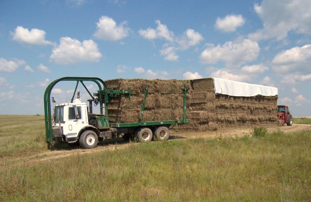 Hay baling program saves money, benefits community
