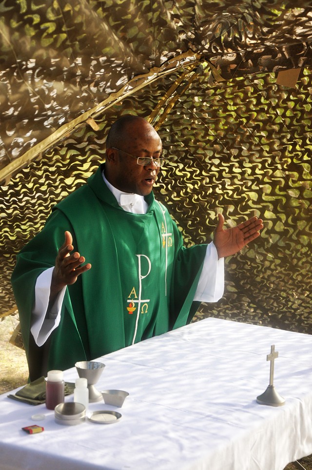 FORT HOOD, Texas-Chaplain (1st Lt.) Thomas Obiatuegwu, a native of Nigeria, delivers his first field Mass to Soldiers with the 41st Fires Brigade during the Table XV training exercise, Sept. 24. Obiatuegwu taught about the importance of...