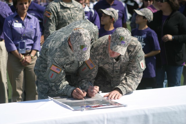 Game sets backdrop for Riley County, Fort Riley covenant signing