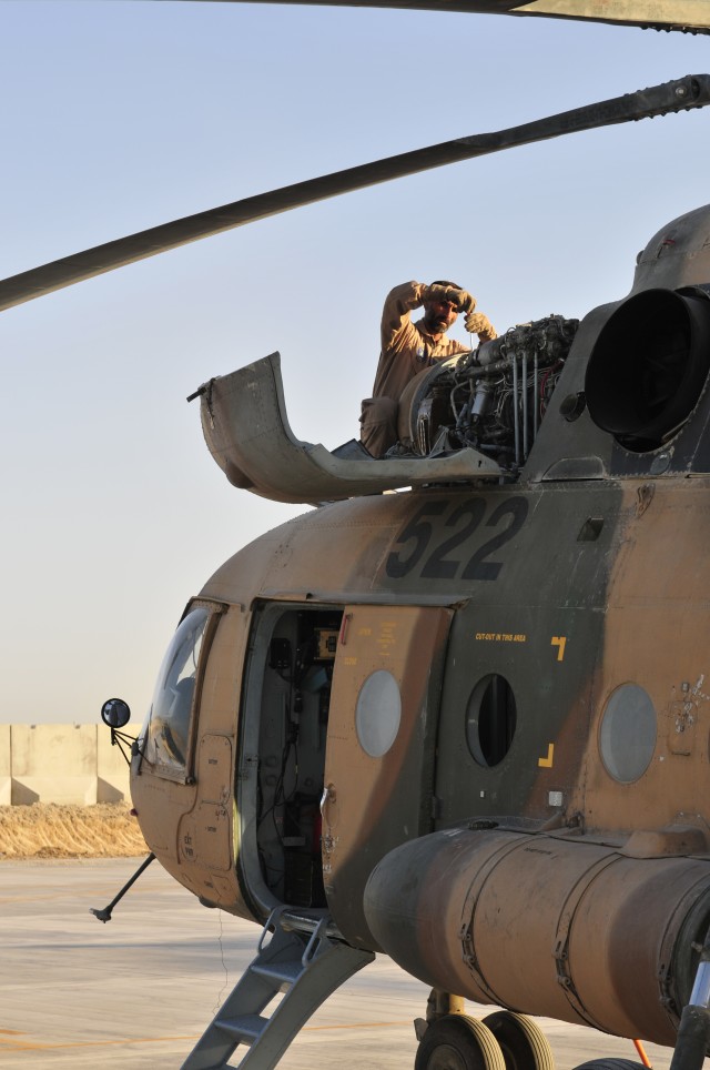 Afghan conducts pre-flight checks 