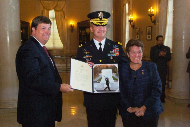 Widow of the youngest Infantryman on Omaha Beach lays wreath at Tomb of the Unknowns