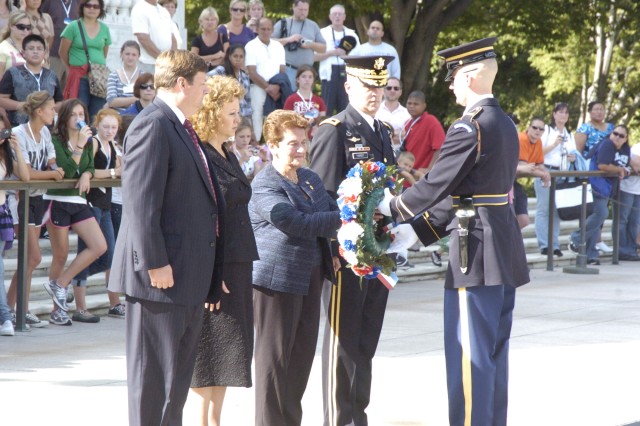 Widow of the youngest Infantryman on Omaha Beach lays wreath at Tomb of the Unknowns