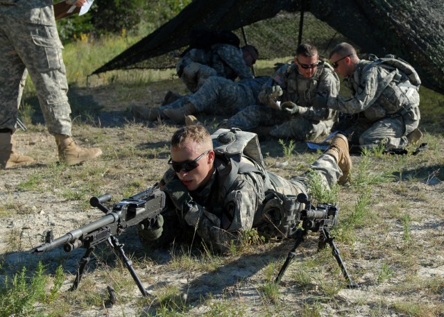 FORT HOOD, Texas -Capt. Phil Leathead, of Jackson, Mo., a platoon leader with Company B, 2nd General Support Aviation Battalion, 227th Aviation Regiment, 1st Air Cavalry Brigade, 1st Cavalry Division, pulls security with the M240B machine gun, while ...