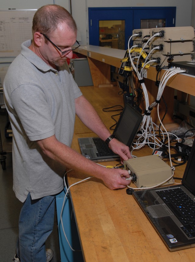 Technicians upgrade global communications system