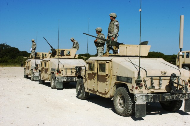 FORT HOOD, Texas- Soldiers from B Troop, 4th Squadron, 9th Cavalry Regiment, 2nd Brigade Combat Team, 1st Cavalry Division, view the engagement zone to gain an understanding of the tasks they will undertake during the regiment's Light-Cavalry Gunnery...