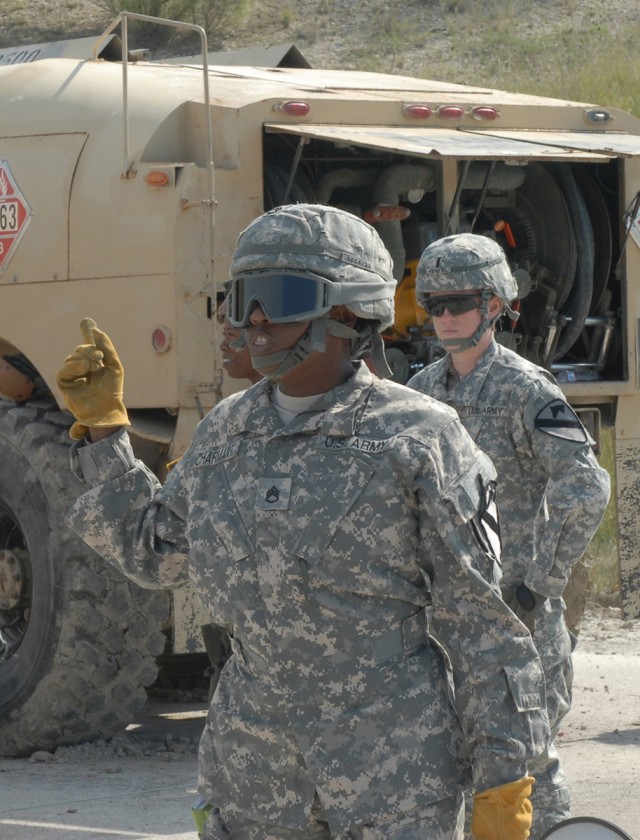 FORT HOOD, Texas--Staff Sgt. Tyra Charmant, of Queens, N.Y., a platoon sergeant with E Company, 1st Attack Reconnaissance Battalion, 227th Aviation Regiment, 1st Air Cavalry Brigade, gives a class to battalion family members about proper...