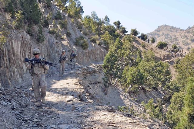 Trekking to cache in Khowst mountains