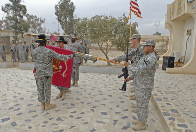 CONTINGENCY OPERATING SITE MAREZ, Iraq - Lt. Col. Bill Galbraith, commander of the 27th Brigade Support Battalion, 4th Advise and Assist Brigade, 1st Cavalry Division and Command Sgt. Maj. Jimmy Rutherford uncase the battalion colors during the...