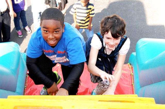 Students practice safety techniques for fire prevention week