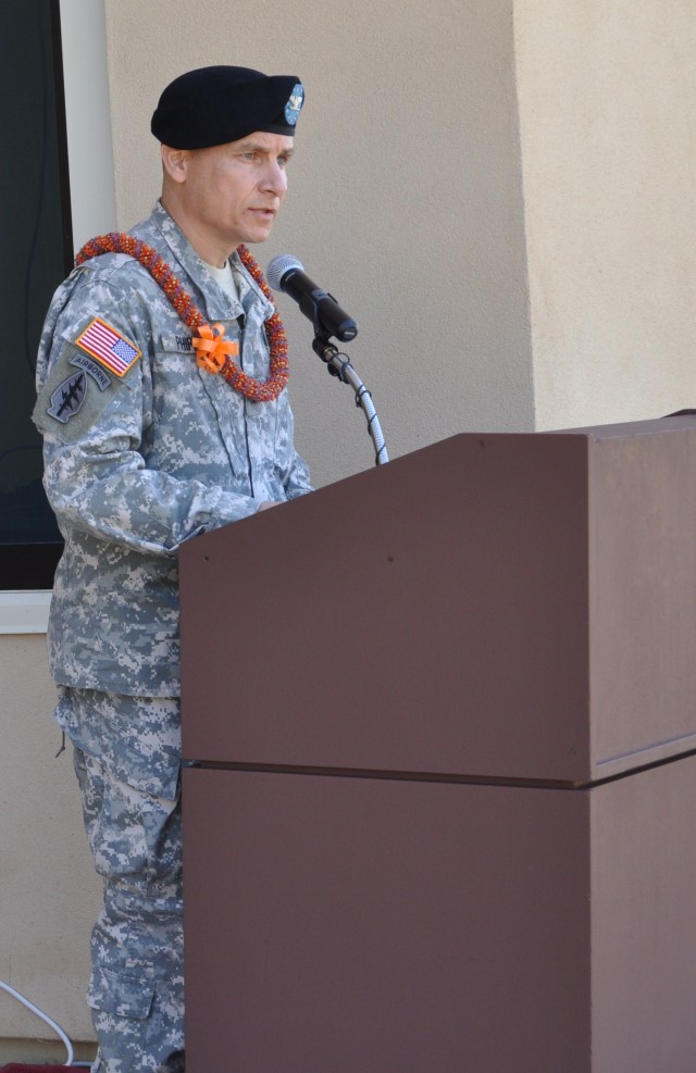 FORT SHAFTER FLATS, Hawaii -- Col. Michael A. Phipps, commander of the U.S. Army Reserve Theater Support Group, addresses distinguished visitors, fellow Soldiers, friends and guests during the opening ceremony of the U.S. Army Reserve Center here,...