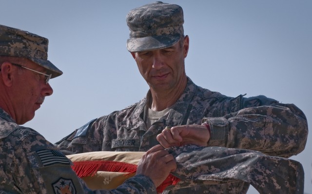 Brig. Gen. Hoover cases unit colors