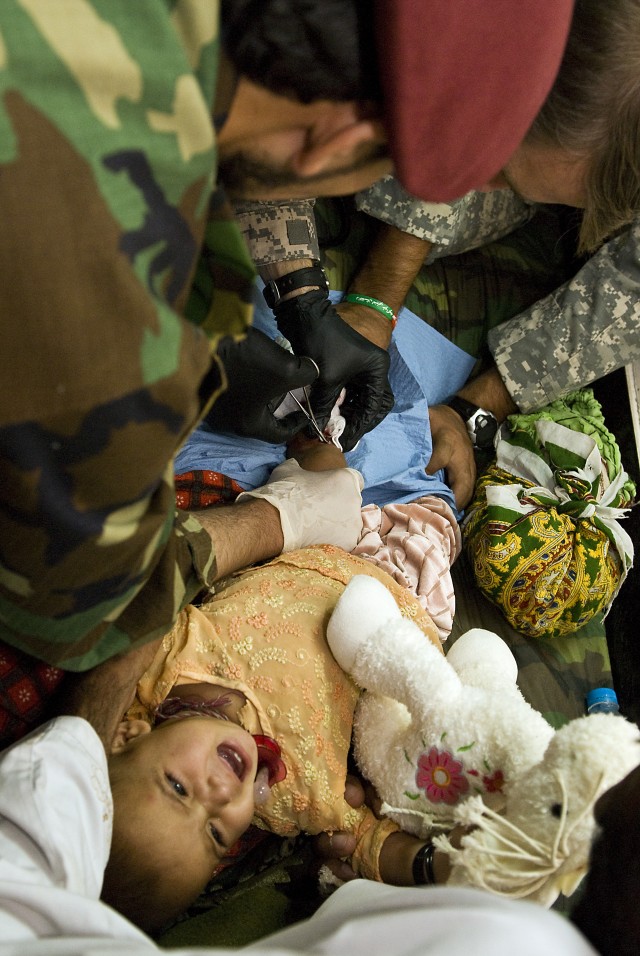 Afghan baby healed through coalition partnership