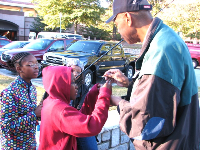 Youth reel in life lessons, fun at final Fort McPherson fishing rodeo