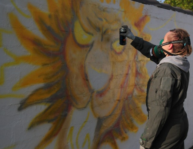 Teens get blank slate with graffiti wall