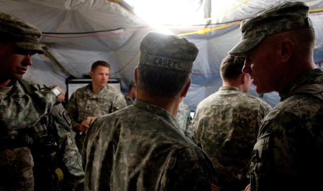 Brig. Gen. Jim Yarbrough, Commanding Gen. of Joint Readiness Training Center, talks with Chief of Staff of the US Army, Gen. George W. Casey Jr., during a Full Spectrum Operation exercise in Ft. Polk, LA, Saturday, Oct. 23, 2010.  The Full...