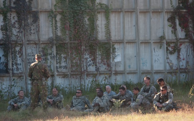Chief of Staff of the US Army, Gen. George W. Casey Jr., joins Company Commanders and 1st Sgt.s during a "tactical freeze" portion of a Full Spectrum Operation exercise in Ft. Polk, LA, Saturday, Oct. 23, 2010.  The Full Spectrum exercise focuses...