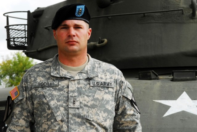 FORT HOOD, Texas- Chief Warrant Officer 2 David Bodily, a Cobbtown, Ga. native and a maintenance control officer for 15th Brigade Support Battalion, 2nd Brigade Combat Team, 1st Cavalry Division, stands in front of a tank on Fort Hood, Texas, Oct....