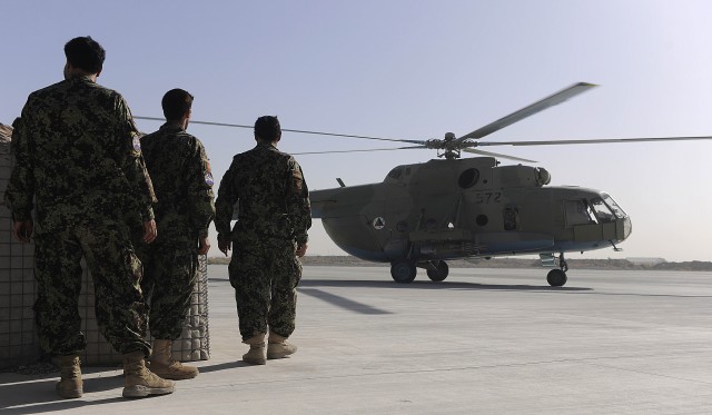 Afghan airmen approach MI-17 helicopter