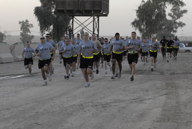 CONTINGENCY OPERATING SITE MAREZ, Iraq - Soldiers assigned to the 4th Advise and Assist Brigade, 1st Cavalry Division, Department of Defense employees  and civilians begin  running the Army Ten-Miler, here, Oct. 24.  Soldiers in the Long Knife brigad...