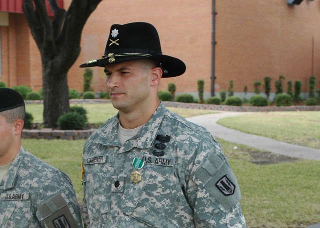 FORT HOOD, Texas-Lt. Col. Steven Carpenter, executive officer of the 41st Fires Brigade, received an Army Commendation Medal during an awards ceremony Oct. 22 for placing first in the third annual brigades' officer APFT Challenge with a score of 383 ...