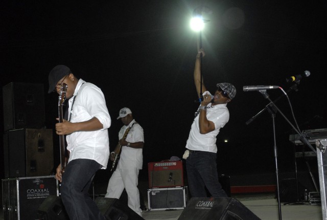 CONTINGENCY OPERATING SITE MAREZ, Iraq - Mint Condition, a rhythm and blues band, performs for Soldiers assigned to the 4th Advise and Assist Brigade, 1st Cavalry Division and Department of Defense employees during a concert Oct. 28. The 4th AAB...