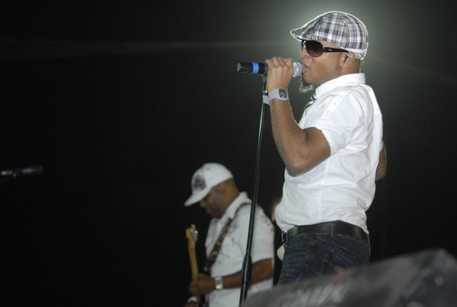 CONTINGENCY OPERATING SITE MAREZ, Iraq -Stokley Williams, the lead singer for the group Mint Condition, sings to Soldiers assigned to the 4th Advise and Assist Brigade, 1st Cavalry Division, Oct. 28. The rhythm and blues band showed appreciation...