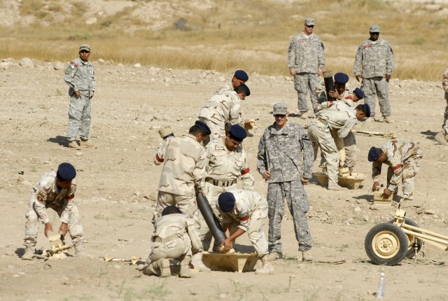 CONTINGENCY OPERATING SITE, Marez- Soldiers assigned to the 6th Brigade, 3rd Division, Iraqi Army compete to put together a M74 120MM mortar the fastest Oct. 27. Soldiers of the 1st Squadron, 9th Cavalry Regiment, 1st Cavalry Division, gave a trainin...
