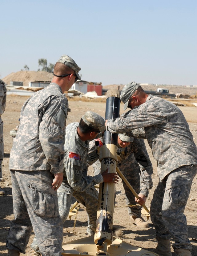 CONTINGENCY OPERATING SITE, Marez-Soldiers of the 1st Squadron, 9th Cavalry Regiment, 1st Cavalry Division, put together a M74 120MM mortar Oct. 26. Soldiers gave a training class to the 6th Brigade, 3rd Division, Iraqi Army to help make them more pr...