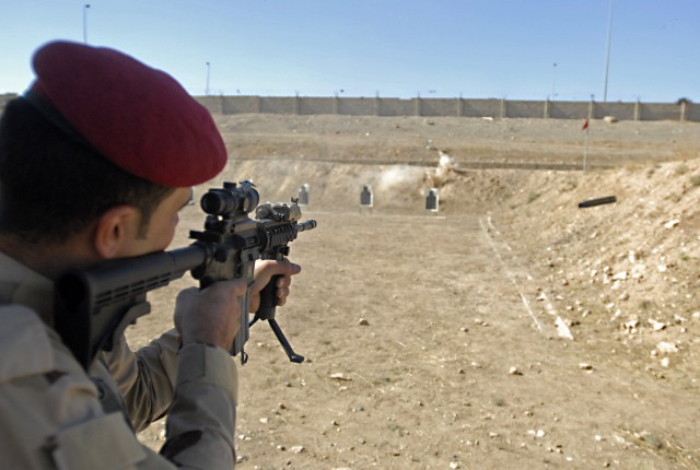 CONTINGENCY OPERATING SITE MAREZ, Iraq-A Soldier from the Iraqi Army's 6th Brigade, 3rd Division, fires a M4 carbine during a basic rifle marksmanship training exercise with Soldiers from Task Force Spear, 4th Advise and Assist Brigade, 1st...