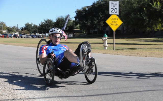 Injured Soldier uses specially designed cycle to build strength and endurance as he recovers
