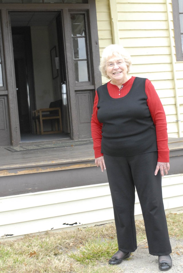 Pearl Follett, 81, visits what once was one of her homes when she lived on Fort Benning.  The former residence is now Building 8, the Garrison Community Life Main Office, and is the oldest structure on post.  Follett lived the first years of her life...