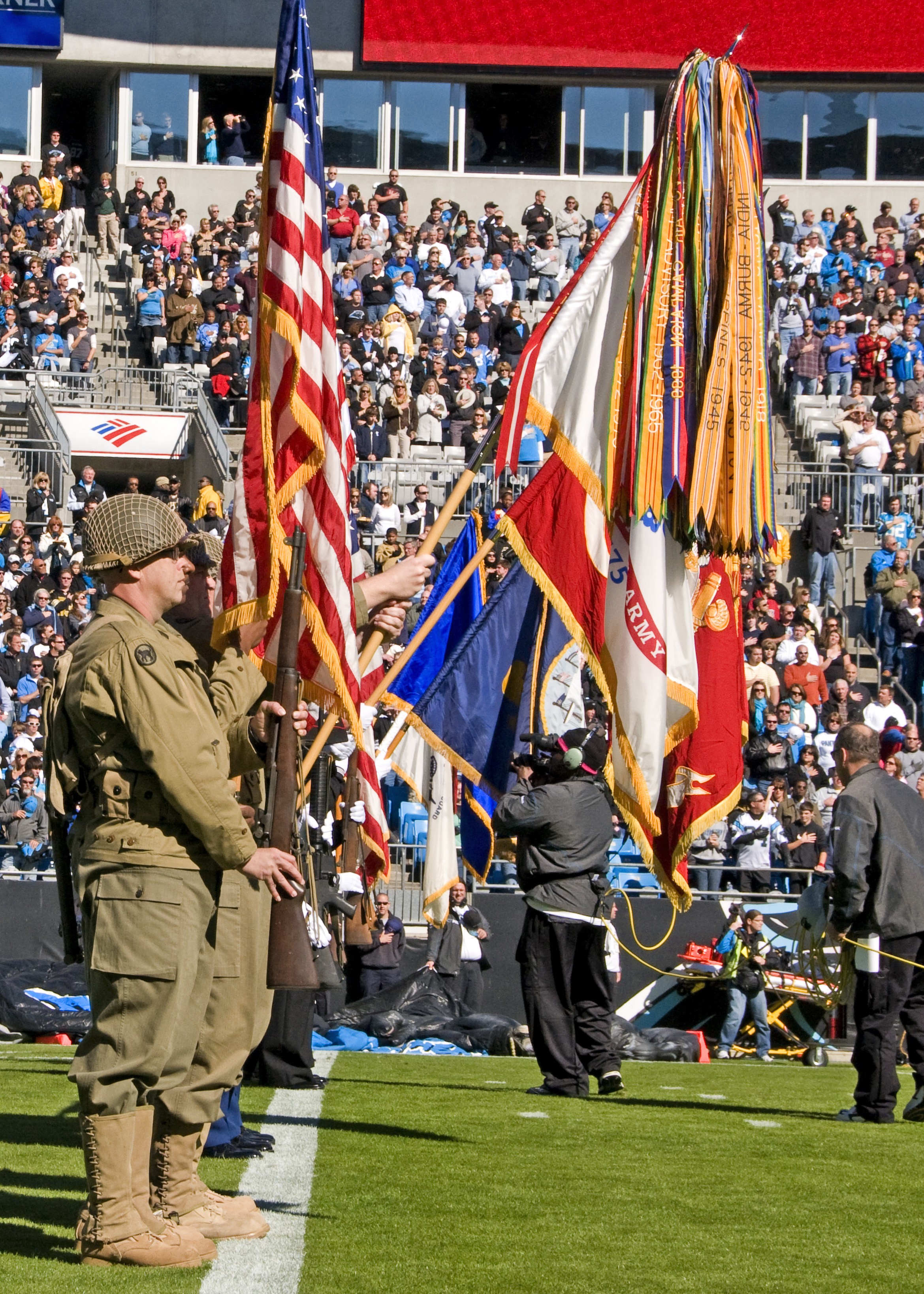 Reserve color guard NCOs honor World War II veterans during NFL