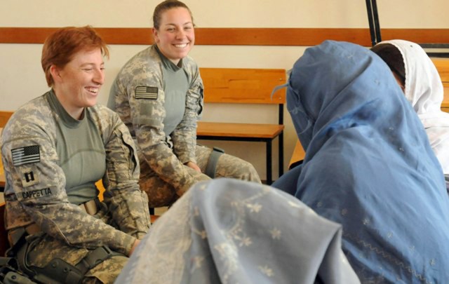 Laughs with Afghan woman
