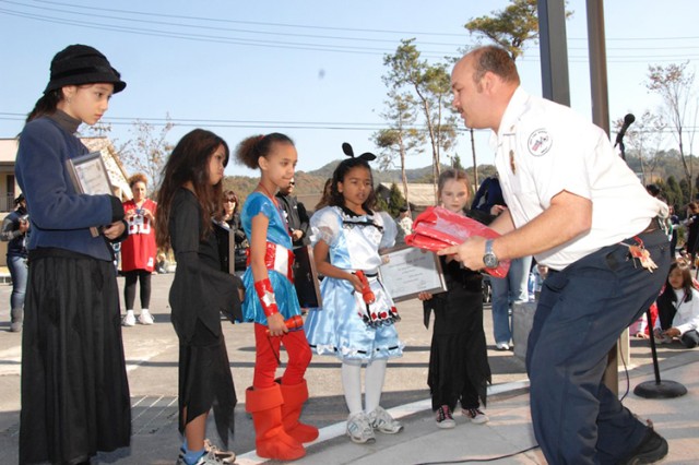 Fire officials present poster, essay awards