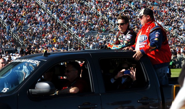 FORT WORTH, Texas - NASCAR driver Jeff Gordon arrives at his #24 car before the start of the AAA Texas 500 at the Texas Motor Speedway, here, Nov. 7.  More than 200 Soldiers from Fort Hood, Texas and various National Guard units throughout Texas were...