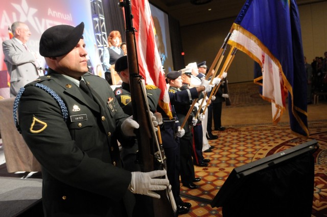 Servicemembers present The Colors