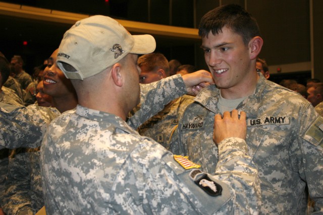 Donning infantry insignia