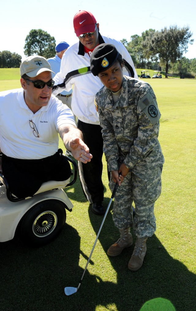 PGA Tour pros salute Warrior Transition Unit Soldiers at golf clinic
