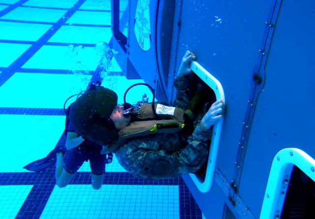 25th CAB pilots, air crews practice water survival skills