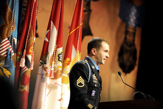 Medal of Honor recipient Army Staff Sgt. Salvatore Giunta thanks his teammates from Company B, 2nd Battalion, Airborne, 503rd Infantry Regiment and all those in the room that helped shape his life, during his induction ceremony into the Hall of Heroe...