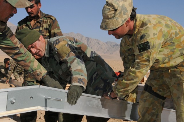 Afghan engineer soldiers build patrol base, relationships