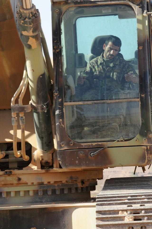 Afghan engineer soldiers build patrol base, relationships