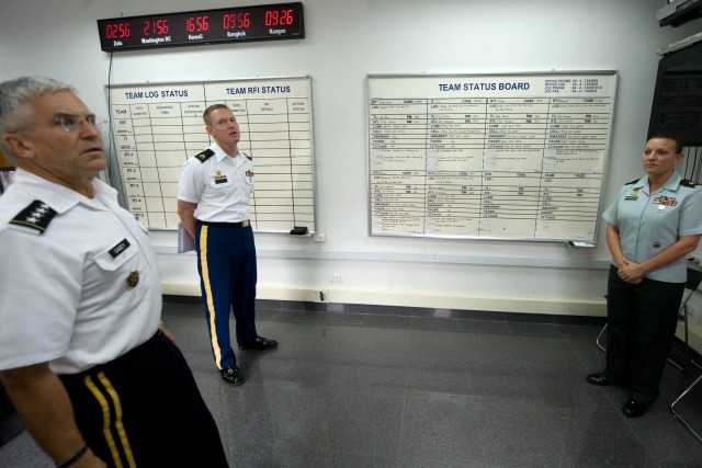 Joint POW/MIA Accounting Command Staff Sgt. Holtman brief his unit's current operations to Chief of Staff of the US Army, Gen. George W. Casey Jr., in Hanoi, Vietnam on Nov. 22, 2010.  The mission of JPAC is to achieve the fullest possible accounting...