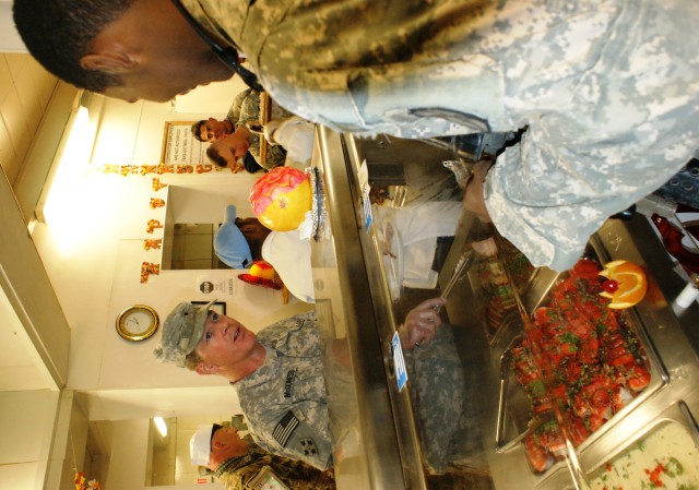 Army general awards Airman on Thanksgiving Day