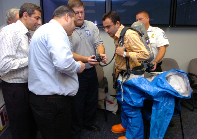 Capt. Jalal Kasouati dons a HAZMAT &#039;moon suit&#039;