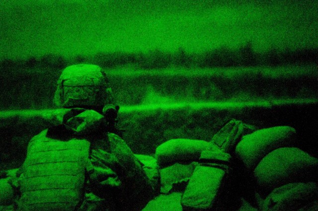 U.S. Soldier provides rooftop night watch
